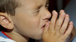 child-praying-on-shutterstock